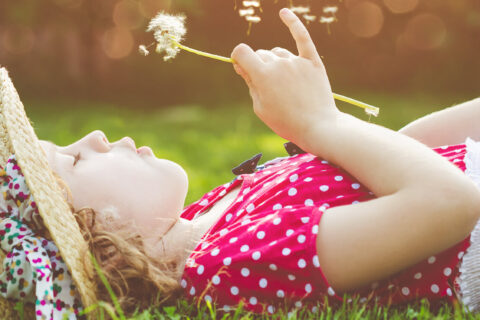 kid with flower