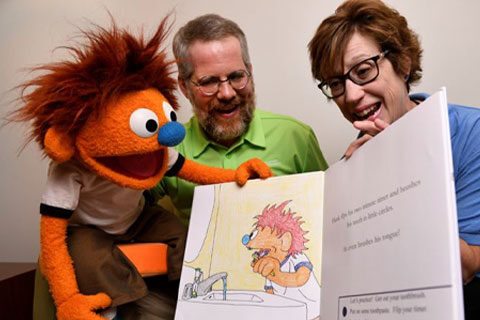 Hank-with-Adults-reading
