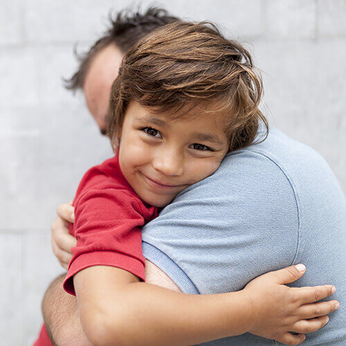 boy-hugging-dad